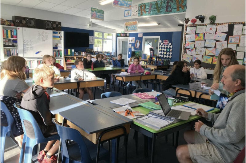 Malcolm Hepburn and the Room 5 students in class at Ngatimoti School.